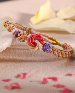 Bracelet with knot of peach blossoms