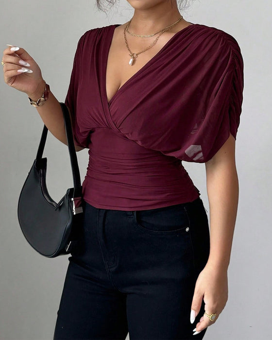 Solid Color Deep V-Nee Waist Short Sleeve Blouse