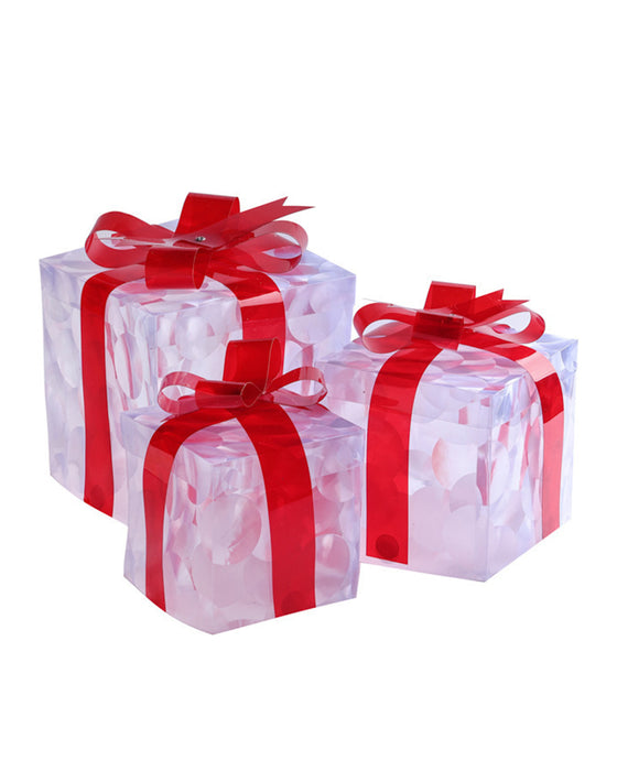 Christmas Decorations In The Form Of Glowing Gift Boxes