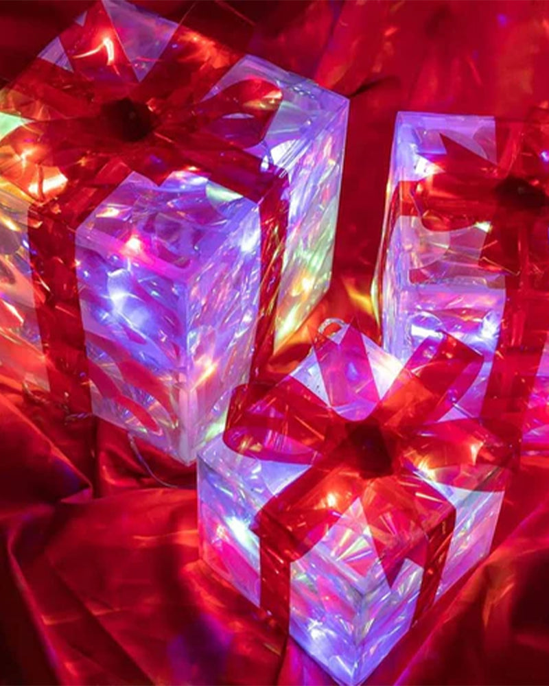 Christmas Decorations In The Form Of Glowing Gift Boxes