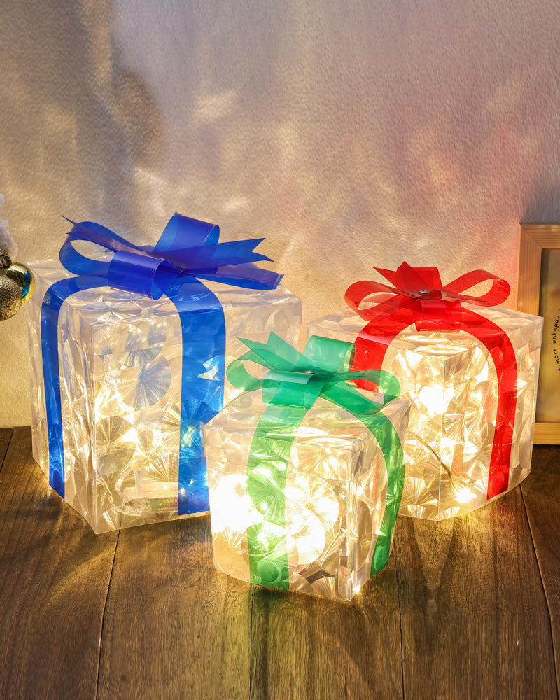 Christmas Decorations In The Form Of Glowing Gift Boxes