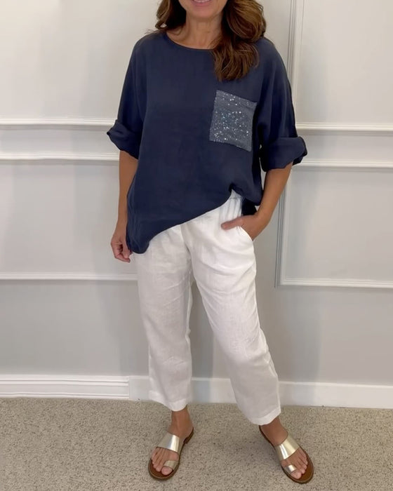 Paneled sequin pocket crew neck top