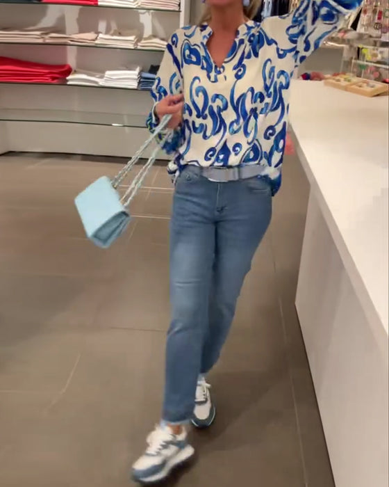 Elegant long-sleeved top with printed V-neck