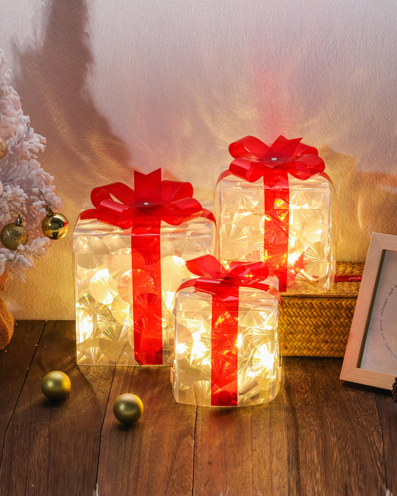 Christmas Decorations In The Form Of Glowing Gift Boxes