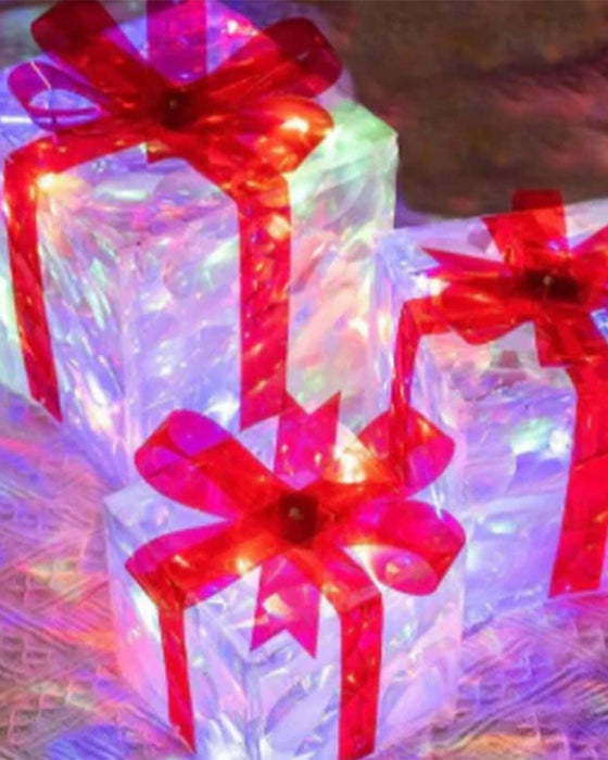 Christmas Decorations In The Form Of Glowing Gift Boxes