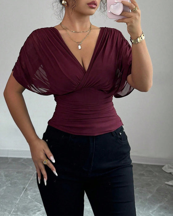 Solid Color Deep V-Nee Waist Short Sleeve Blouse