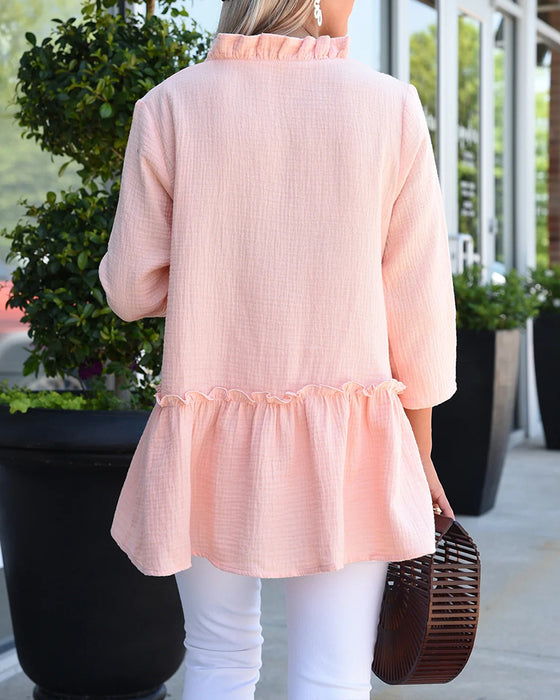 Stylish V-Neck Blouse With Ruffled Trim.
