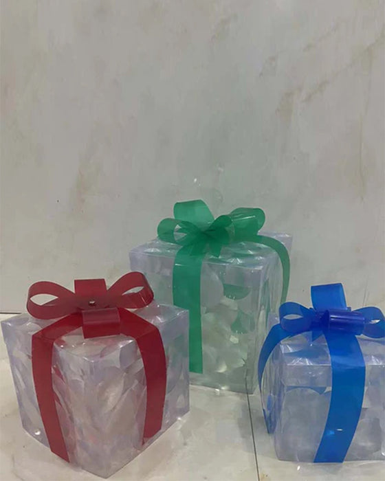 Christmas Decorations In The Form Of Glowing Gift Boxes