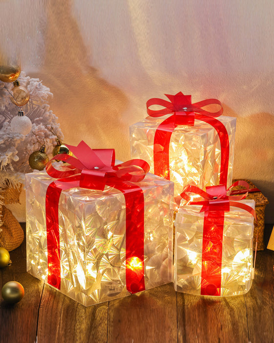 Christmas Decorations In The Form Of Glowing Gift Boxes