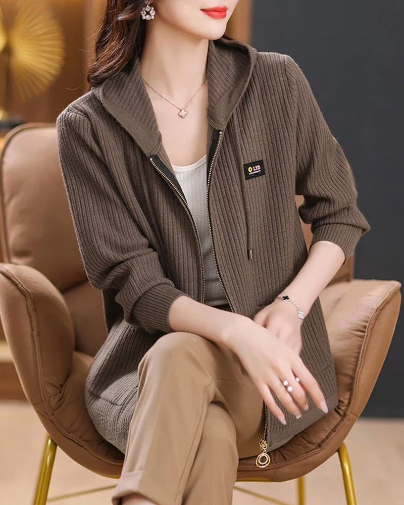 Jacket With Hooded Zipper Closure