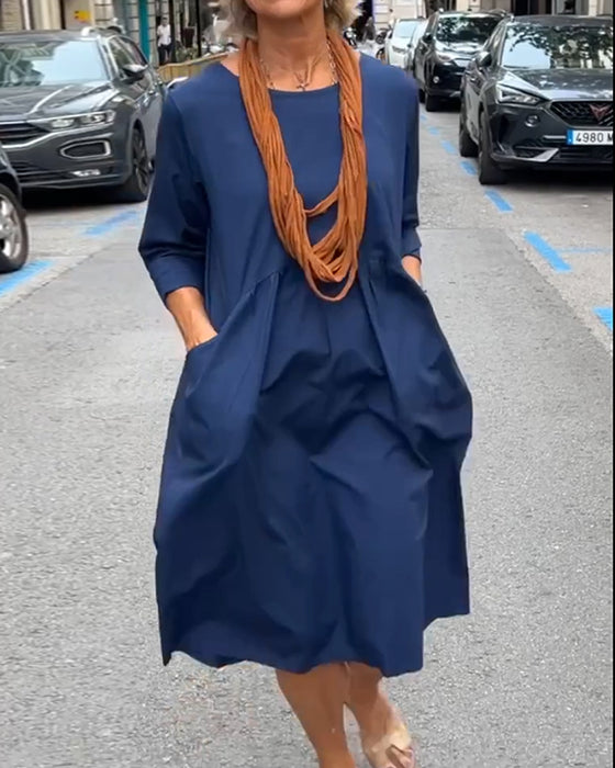 Round neck dress with pockets