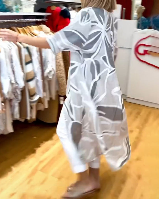 Loose irregular long top