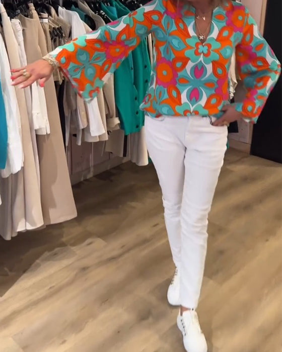 Loose and versatile printed blouse