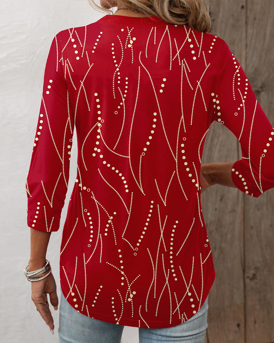 Elegant button print top with V neck