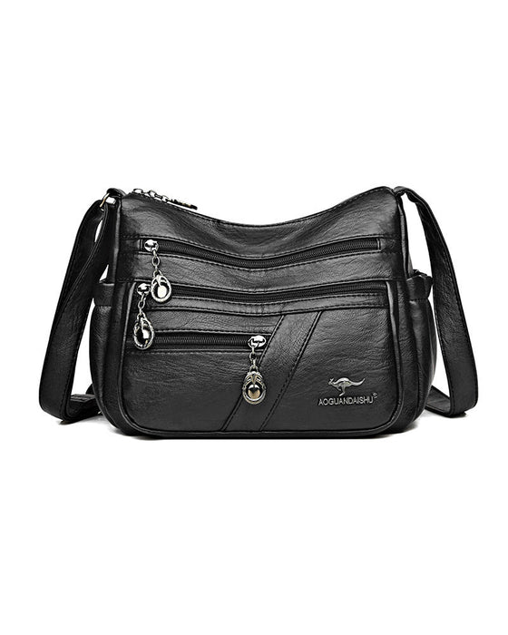 Multi-pocket soft leather crossbody bag