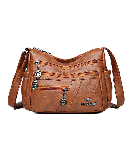 Multi-pocket soft leather crossbody bag